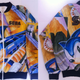 Illustration for article titled Your Eyes Are Not Ready For This Hideous Sega Jacket